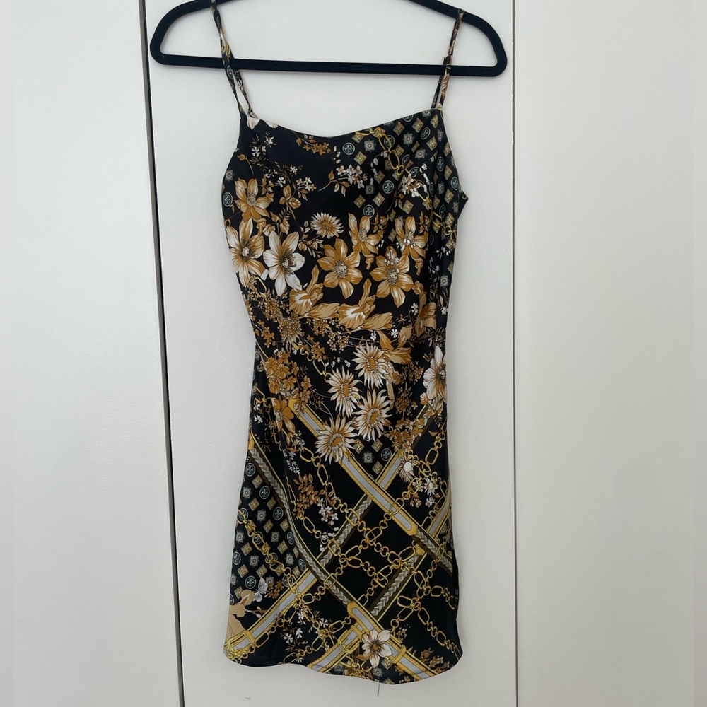 Black and gold mini dress